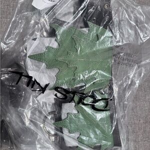 Dolls Kill leafy pockets belt